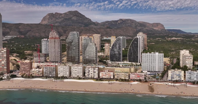 Beachfront Skyline with Mountain Backdrop