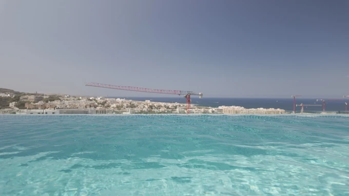 Cityscape with Pool and Crane