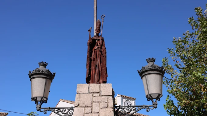 Historic Statue with Lamps