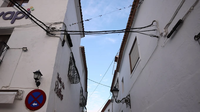 Narrow Alley with Overhead Wires