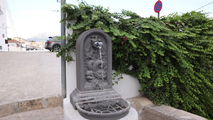 Rustic Water Fountain in Urban Setting