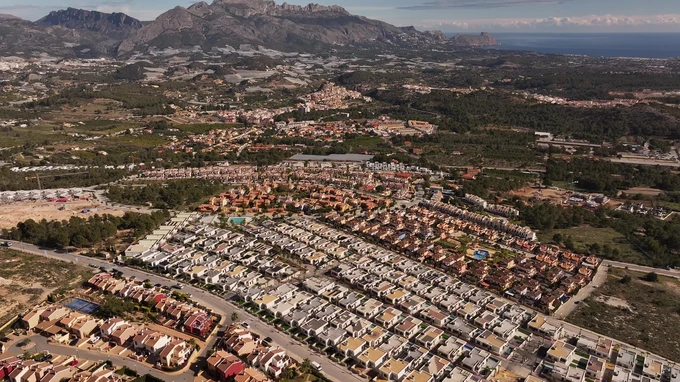 Aerial View of Residential Area and Mountains