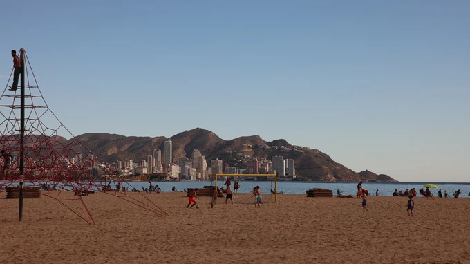Beach Playground with City Skyline