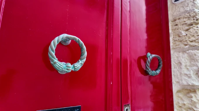 Red Door with Unique Knocker
