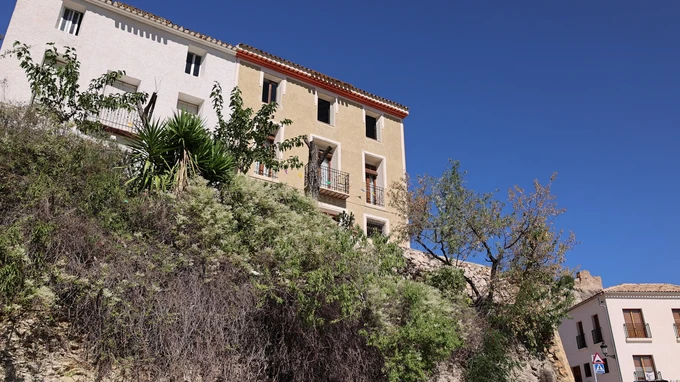 Hillside Houses under Blue Sky