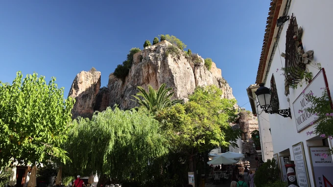 Charming Village with Rocky Cliff