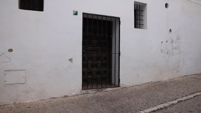 Wrought Iron Door on White Wall