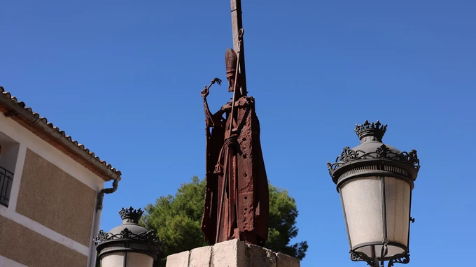 Statue and Street Lamps in Architectural Setting