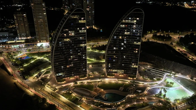 Night Cityscape with Illuminated Towers